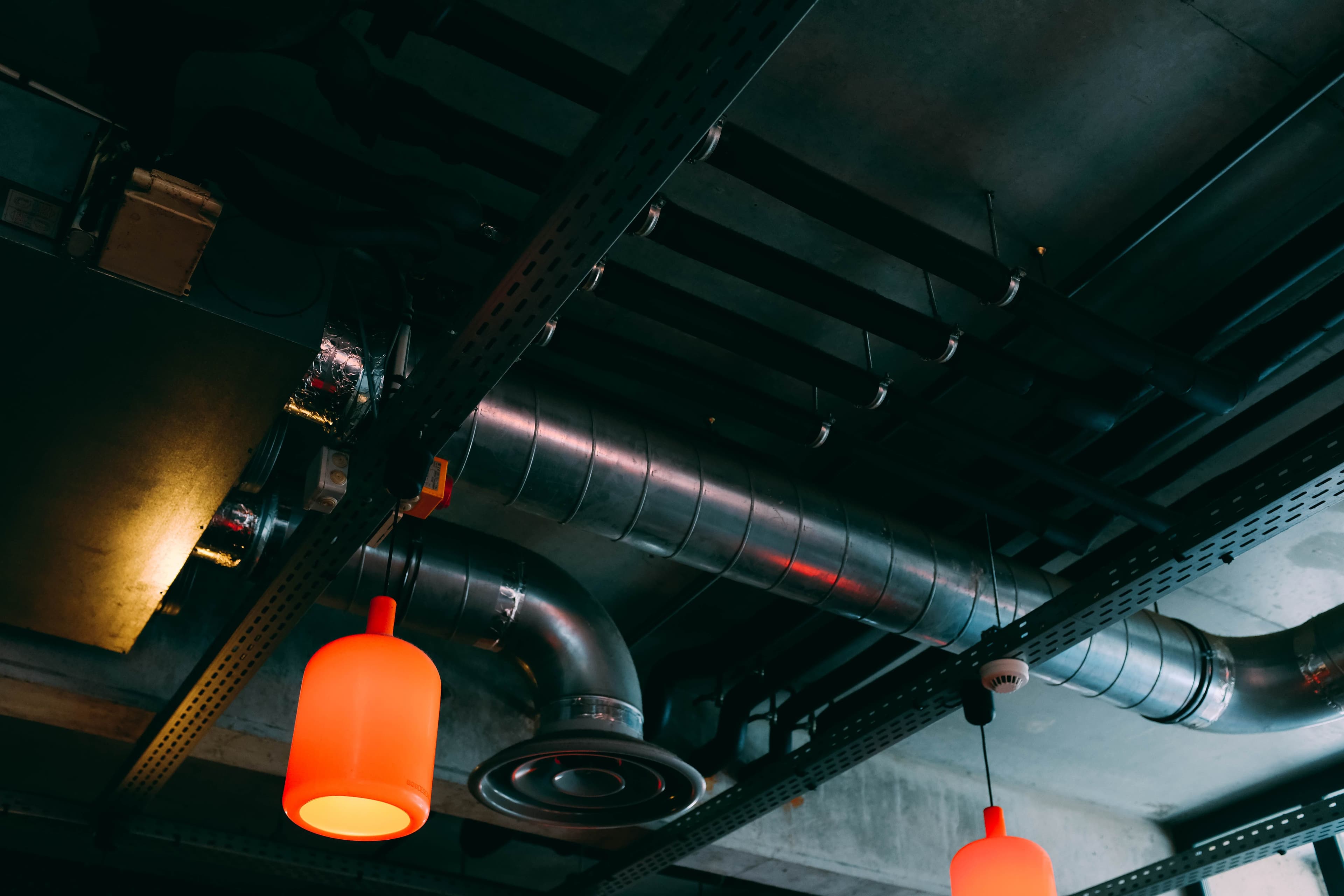 Exposed ductwork and mechanical services at ceiling level